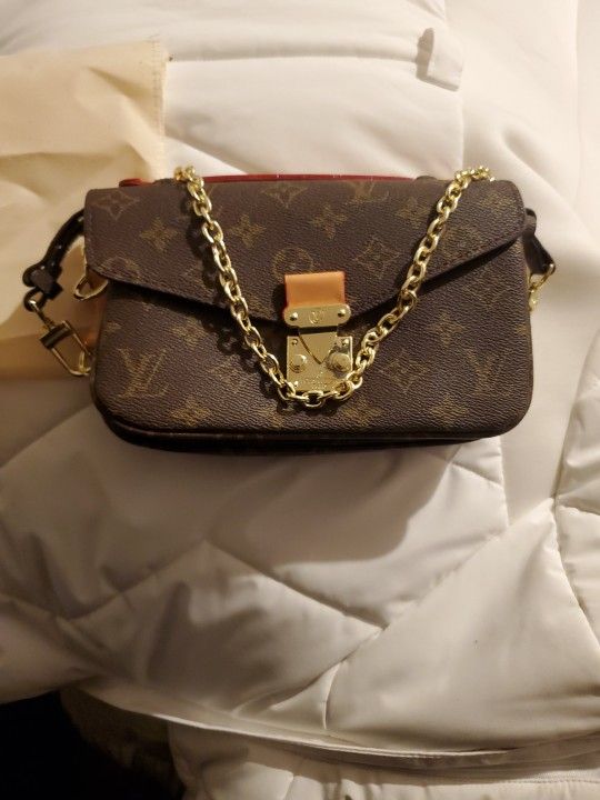 Louis Vuitton Momen Handbag