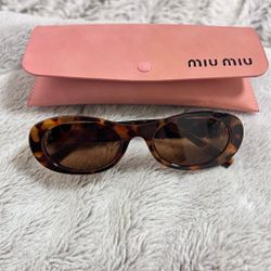 Miu Miu Tortoise Shell Sunglasses