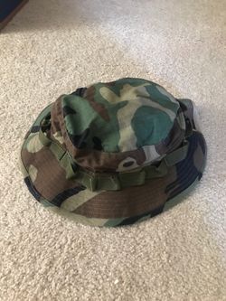 Camo bucket hat with utility straps