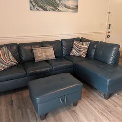Like New Blue Faux Leather Couch with Chaise and Ottoman