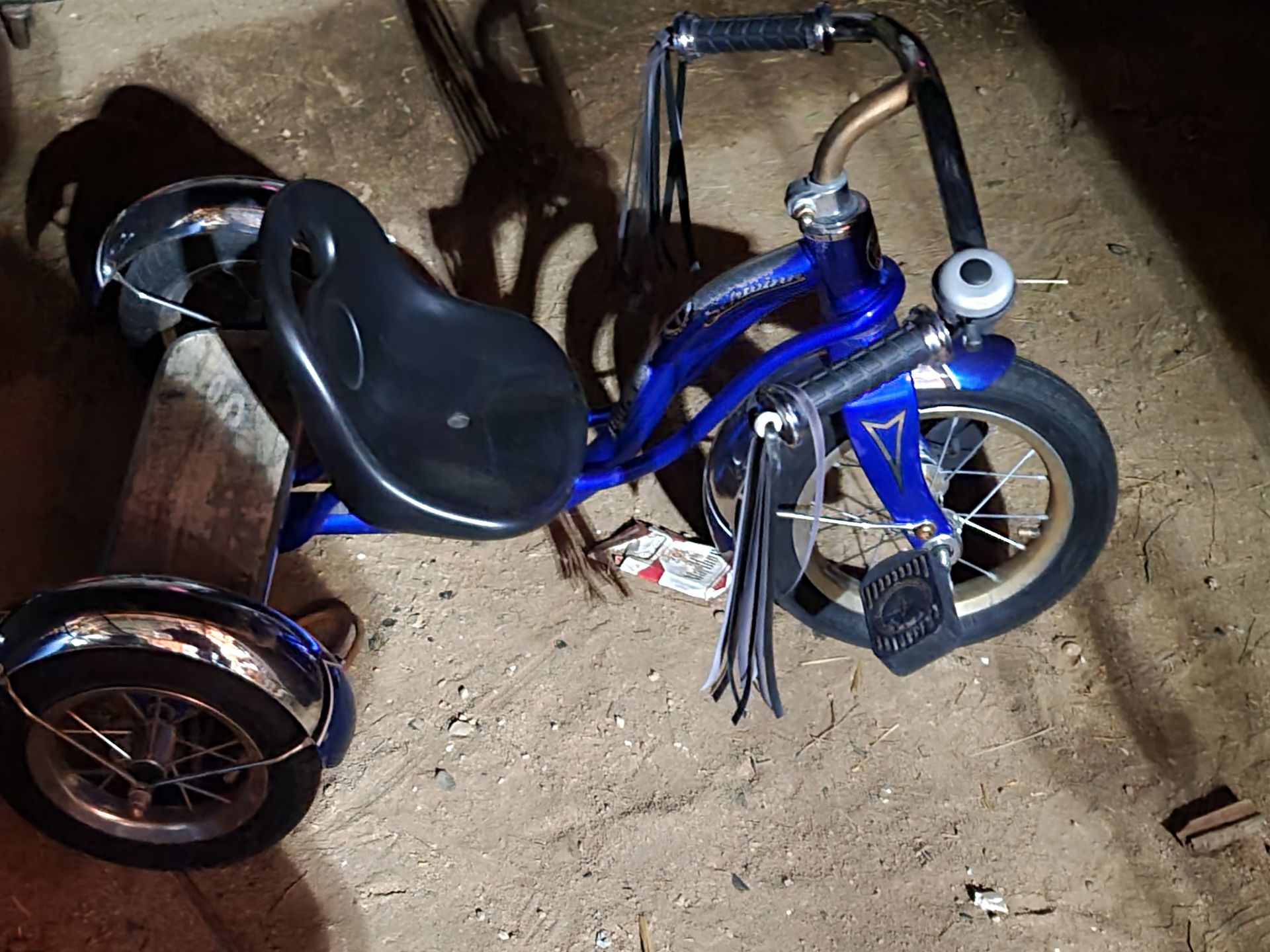 Schwinn blue tricycle