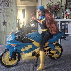 Batgirl Barbie with bike