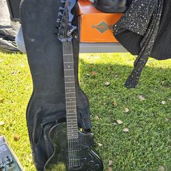 Electric Guitar With Amp And Bag