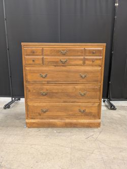 Traditional Brown Wood Chest of Drawers with Ornate Pulls