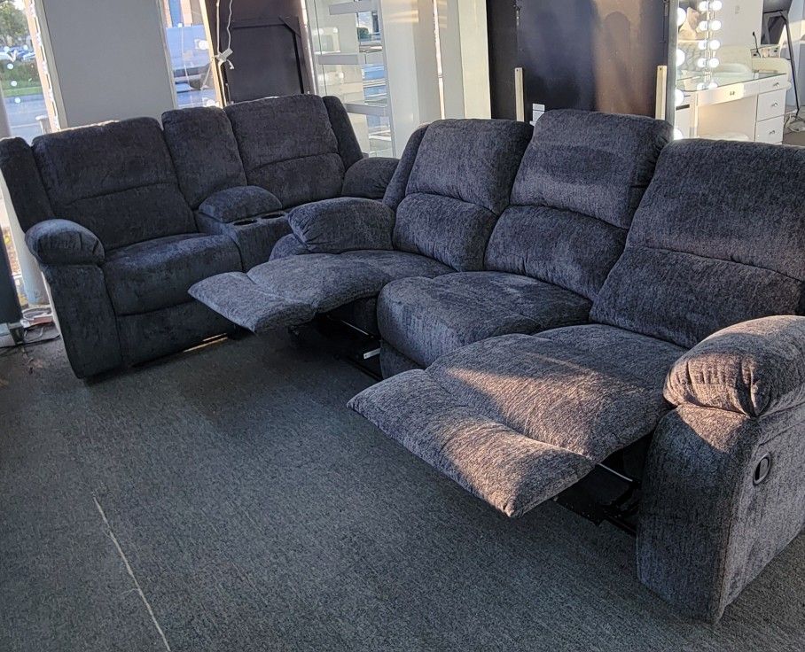 This plush L shaped sectional is a spacious gathering spot to entertain friends and family. The sectional stands in low legs that are just barely visi