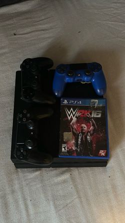 PS4 Console with 2 Controllers and WWE 2K16