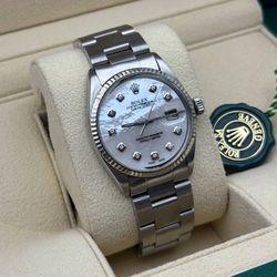 1975 Rolex Datejust 1601 36mm natural MOP diamond dial stainless steel oyster bracelet white gold fluted bezel watch box appraisal papers