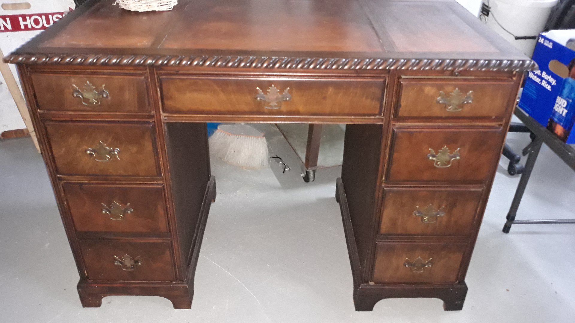 Antique desk with leather inlay top