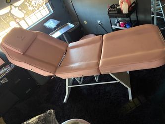 pink tattoo / massage chair
