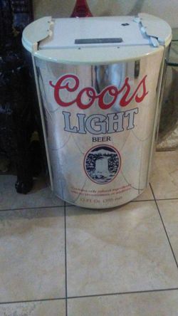 Coors Light refrigerator four and a half feet up between 5
