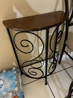 Small table and dog and ma picture