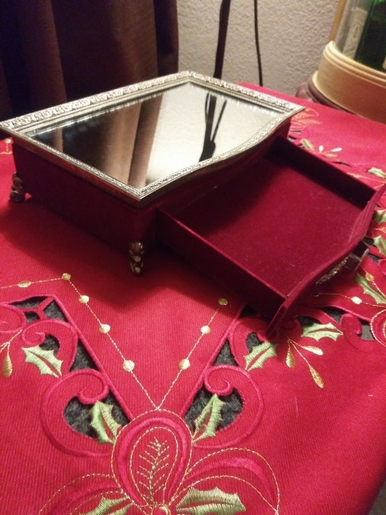 Beautiful antique jewelry box with mirror on top and red velvet on outside(lil heavy)