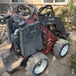Early 2000s Toro Dingo 322 Tractor 