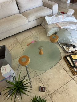 Modern Glass Coffee Table with Rotating Shelf