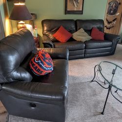 Leather Couch And Oversized Chair/Loveseat 2 End Tables 1 Cocktail Table 1 Flat Screen TV