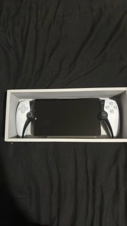 PlayStation portal with wireless earbuds