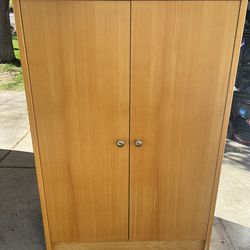 Wood Cabinet- free standing 3 shelves, two doors, and might deliver for free if you’re close enough.