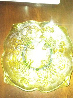 Vintage green glass candy dish with grape and leaves design