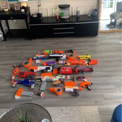 A BUNCH OF NERF GUNS 