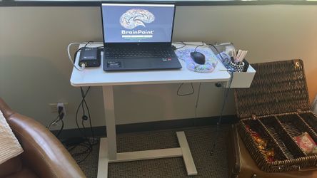 Adjustable stand with removable basket