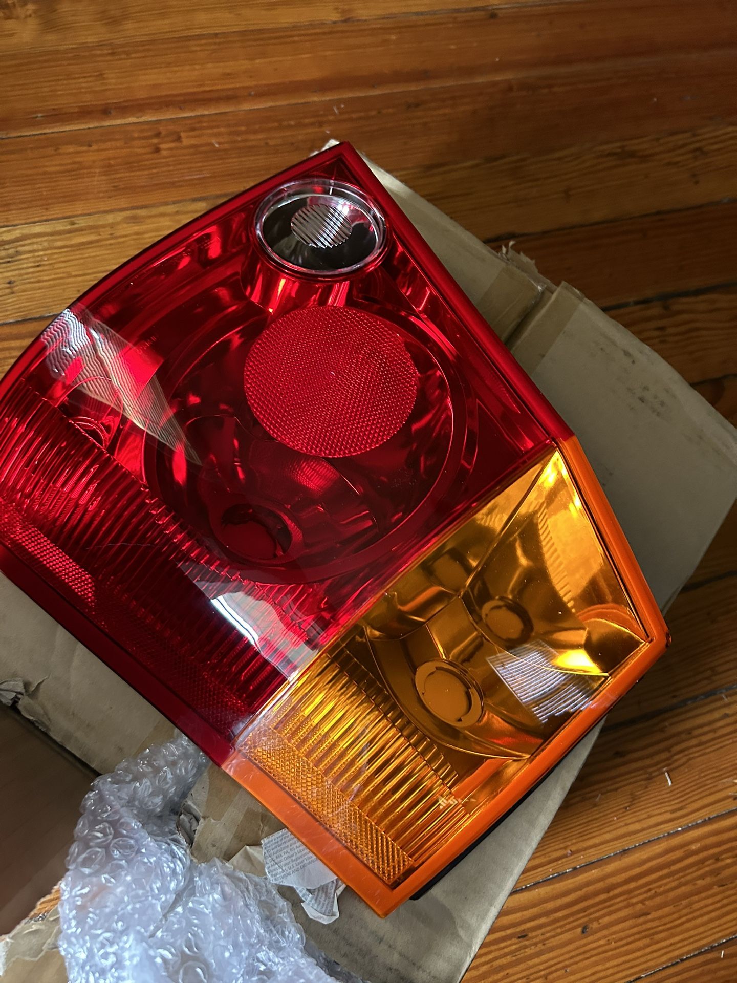 Tail light for a 2005 Chrysler Pacifica