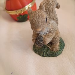 Squirrel figurine standing up four bucks firm price pick up only 865 Ellsworth avenue right off of East Livingston avenue Columbus Ohio 43206 5 minute