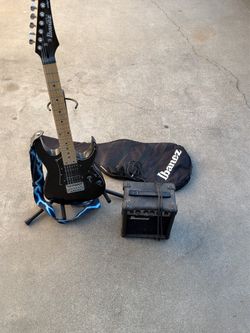 ibanez guitar mikro with amplifier and stand
