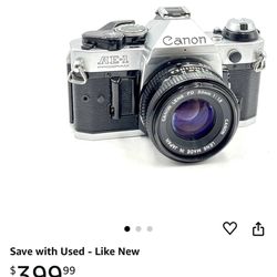 Vintage Canon AE-1 Program 35mm SLR Camera with 50mm 1:1.8 Lens 