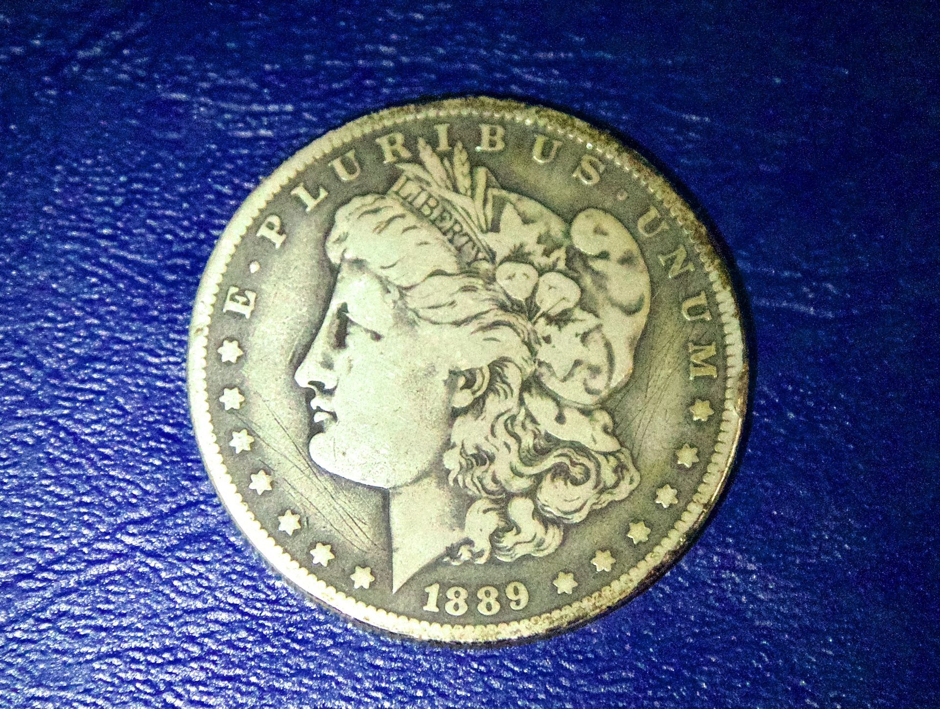 1889 “O” Morgan Silver Dollar w cameo toning