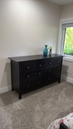 Solid wood dresser, nightstand, and full size bed frame with mattress.