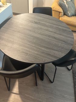 Round Dining Table with 4 Black Chairs
