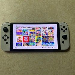 NINTENDO SWITCH OLED with 100 Popular Switch Games