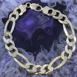 $525 Silver Figaro Bracelet
