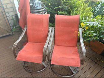 Orange patio chairs with extra fabric