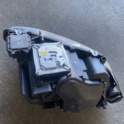 07-13 BMW 328I convertible left headlight