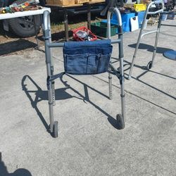 Foldable Walker With Detachable Pouch To Hold Things