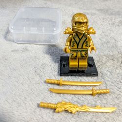 LEGO Ninjago Lloyd Golden Ninja With Golden Shoulder Armor And 3 Weapons