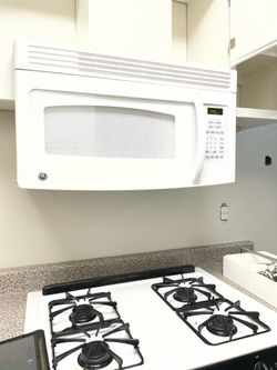 White appliances set, stove,microwave and dishwasher