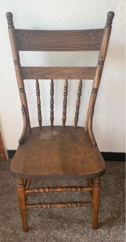 Vintage Solid Wood Spindle Back Chair Farmhouse Style  Vintage solid wood spindle back chair with carved detail:   • Classic farmhouse / traditional s
