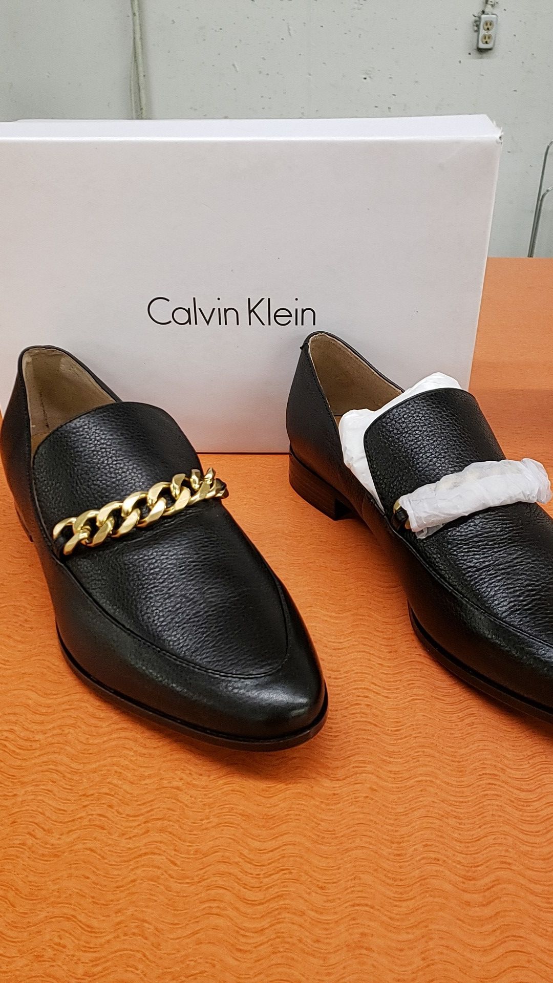 Calvin Klein leather flats.