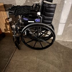 WheelChair -Like New With Foot Pedals