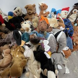 43 Beanie Babies, Rare Valentino, Patti, Chocolate And More