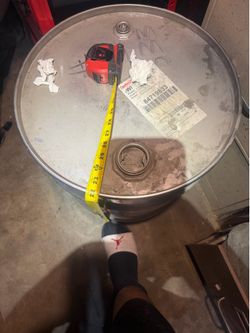 25. Gallon drums close top can be for gas, diesel, oil. Other hazard is material.