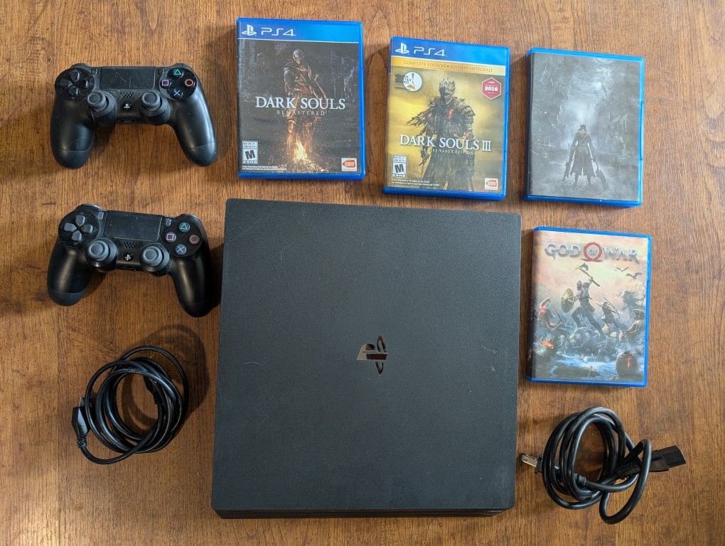 PS4 Pro with Two Controllers, 4 Games