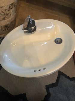 White farm house faucet and sink