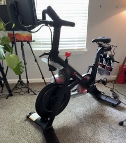 Like-New Peloton Bike with Size 8 Shoes