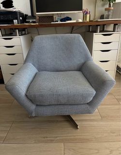 One Blue Fabric Swivel Chair