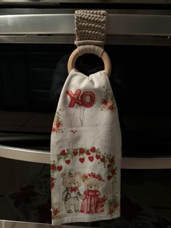 Homemade crochet oven towel holder with towel
