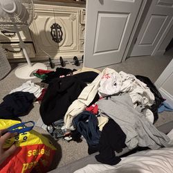 Big ahh bundle of clothes of both men and women all sizes