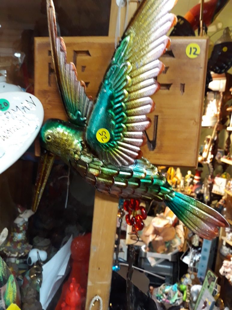 Colorful metal hummingbird wall art